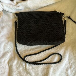 A the SAK black purse. L 10 in x H 8 in x D 2 in. Strap drop 24 in